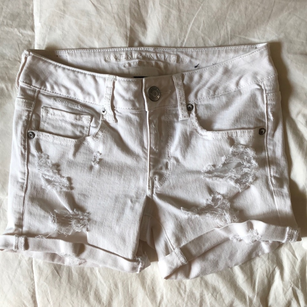 Distressed white American Eagle jean shorts